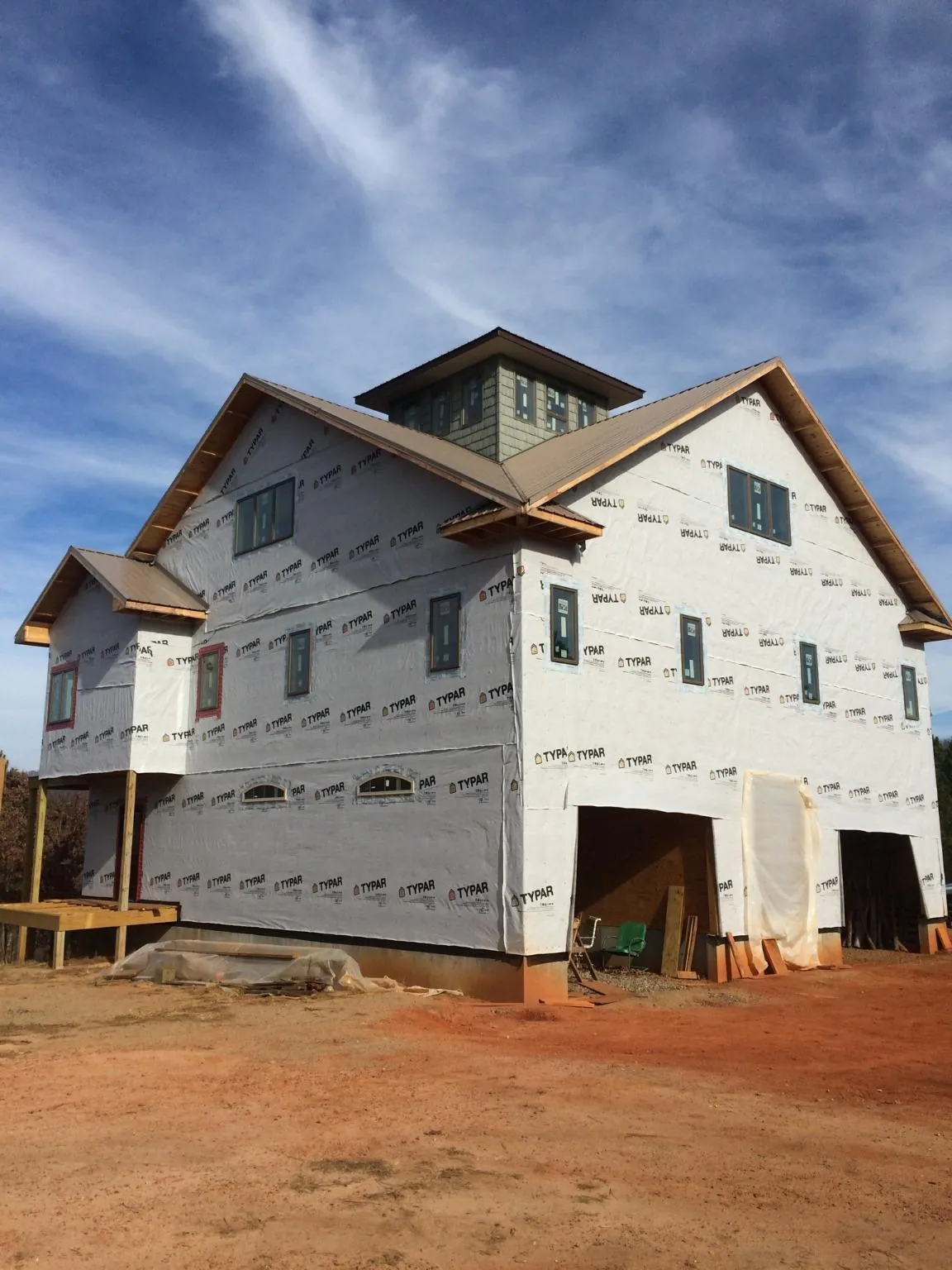 New two story house under construction with a cupola and gabled roofs in Fairfield